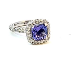 Zilveren ring met paarse diamant en steentjes